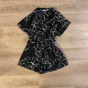 Black romper, never worn, size small